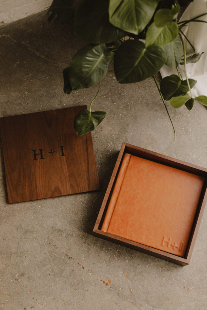 Photo album nested inside its custom walnut storage box